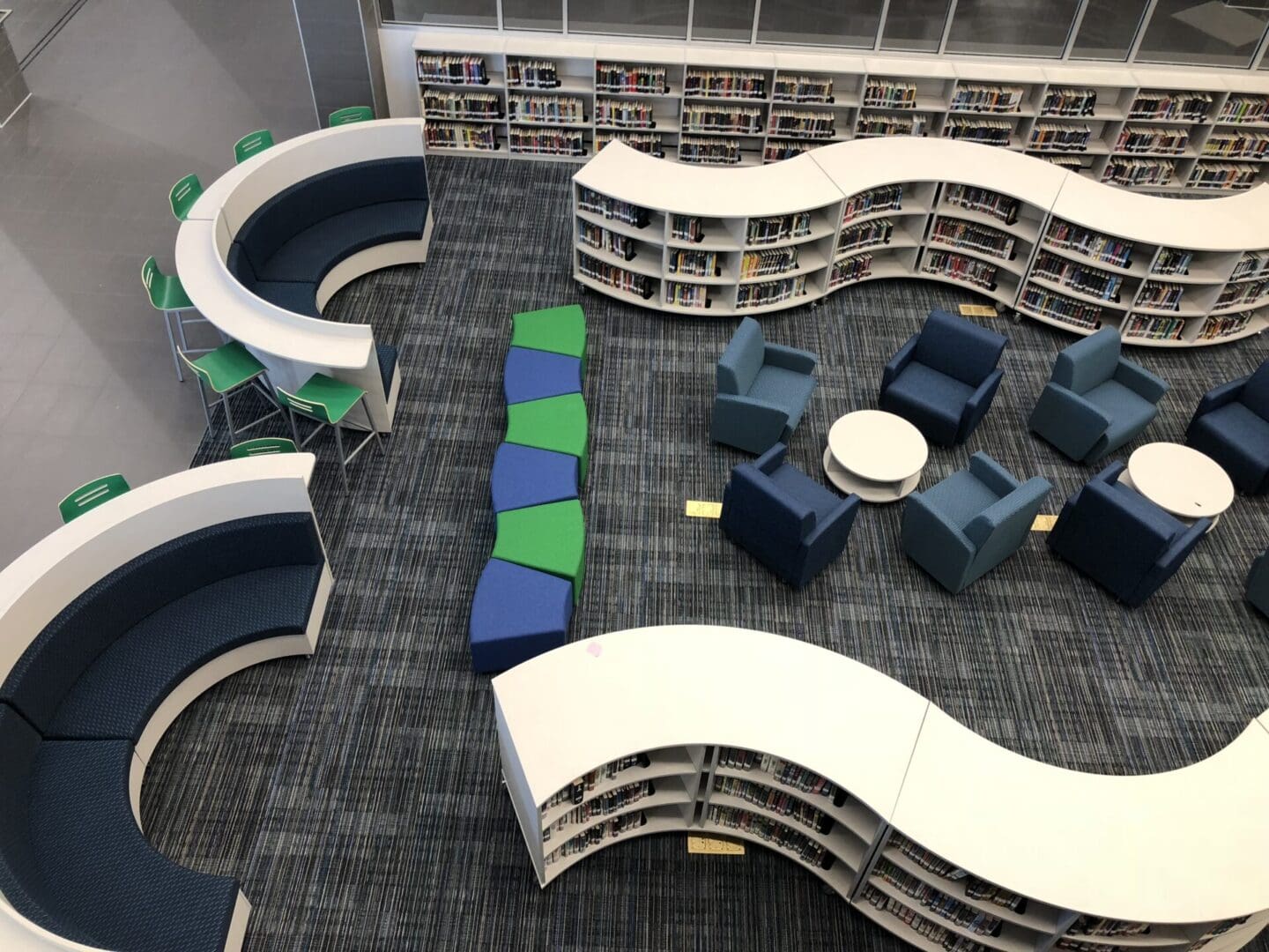 A library with many books and tables in it