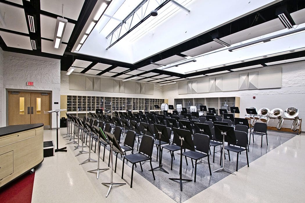 A large room with many chairs and tables
